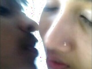 Young Desi couple shares passionate kisses in the open air